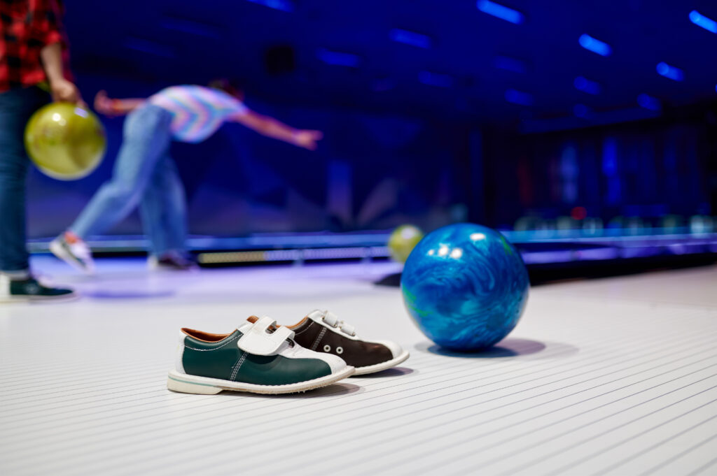 Ball and house shoes, bowling, game concept